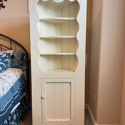 Wooden Corner Cabinet
26" wide, 14" deep, and 65.5" tall 
$75.00