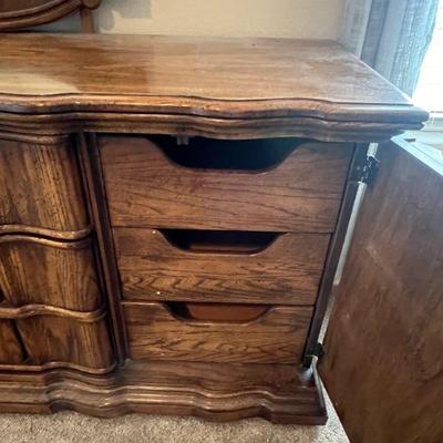 Dresser with Mirror by Burlington measuring 72" wide, 21" deep, and 33" tall without the mirror. 
$225