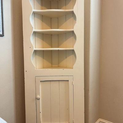 Wooden Corner Cabinet
26" wide, 14" deep, and 65.5" tall 
$75.00