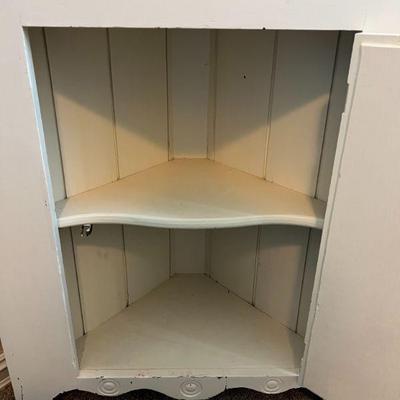 Wooden Corner Cabinet
26" wide, 14" deep, and 65.5" tall 
$75.00