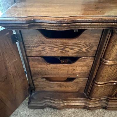 Dresser with Mirror by Burlington measuring 72" wide, 21" deep, and 33" tall without the mirror. 
$225