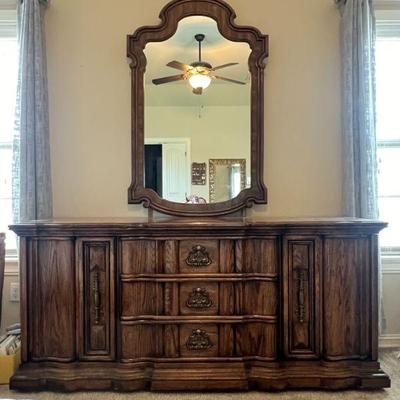 Dresser with Mirror by Burlington measuring 72" wide, 21" deep, and 33" tall without the mirror. 
$225