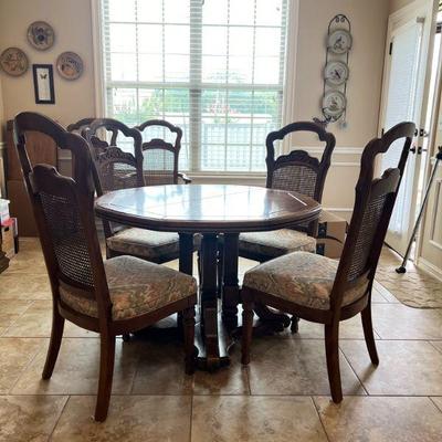 Dining Table and Six Chairs with Two Leaves and a set of Pads
$250.00
