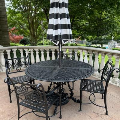 Cast patio set with umbrella and 4 chairs 