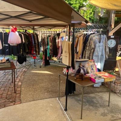 three racks of clothing