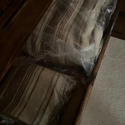 lots of tablecloths and linens 