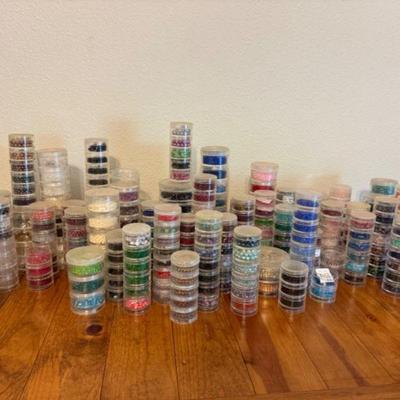 Massive Collection of Assorted Colorful Beads in Clear Containers	