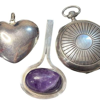 Three Sterling Silver and Amethyst Pendants