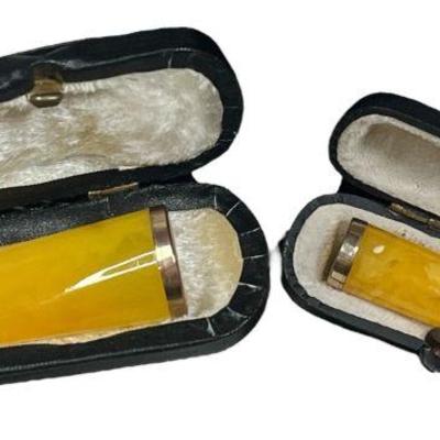 Two Art Deco Butterscotch Amber Cigar Holders
