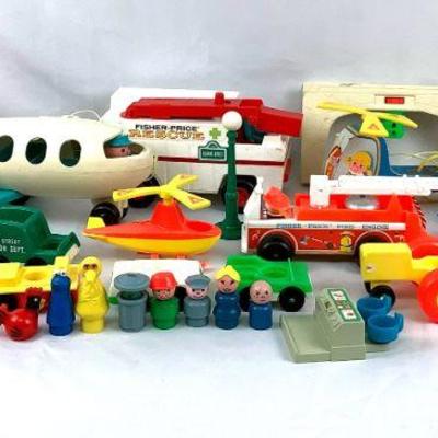 GRLI214 Vintage Fisher Price Toys	All different kind of vintage Fisher Price toys. From airplanes, fire trucks, and small cars to a few...