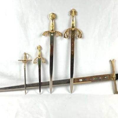 BEDO224 Collection Of Toledo Decorative Swords	Tanto Monta 38" decorative sword made in Spain, has some wear to it, blade isn't...