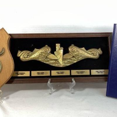 TEMA903 Vintage US Naval Service Plaques And Submarine Humor Book	Two vintage US naval service plaques and a submarine humor book. 
