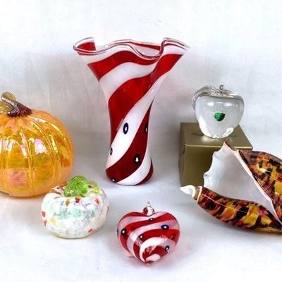 TEMA215 Kusak Glass & Eye Studio Glass Pieces	A glass apple from Kusak Cut Glass Works. Couple of  glass pumpkins from Glass Eye...