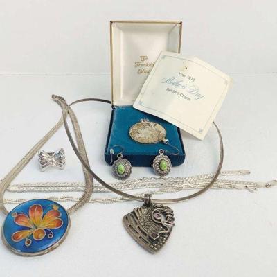 BEDO612 Sterling Jewelry Assortment	This lot includes an assortment of jewelry stamped 925 or sterling, this includes a 1972 Mother's Day...