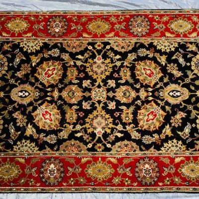 LOAN604 Hand knotted Wool Area Rug	Hand knotted wool area rug has dark and rich color scheme with white contrasting ends. ( 76.5x 48x...