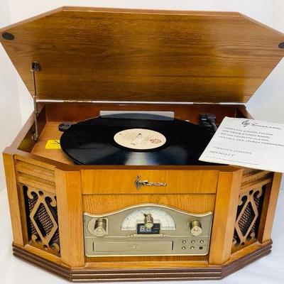 DEJE618 Emerson 4 In 1 Stereo System	This Emerson complete stereo system has Am/Fm radio, a Cd and Cassette player and a full size 3...