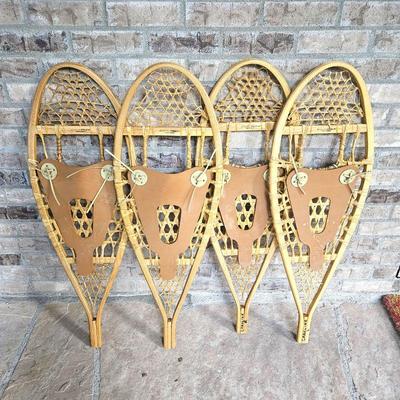 manufactured by SnowTrek in Canada of traditional wood and rawhide