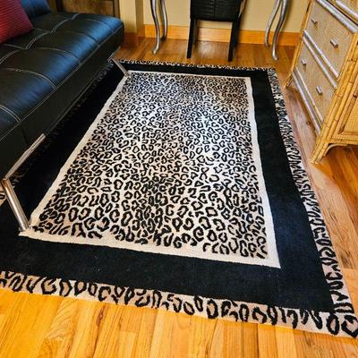 5' x 8' Animal Print Area Rug in Blacks and Beiges