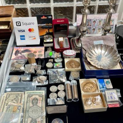 Foreign and domestic coin currency, signed Cartier sterling silver bowl