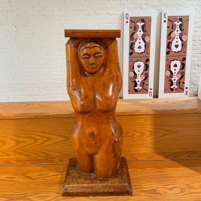 Antique carved female sculpture