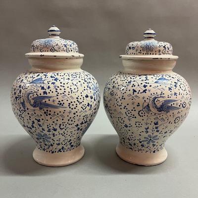 Two Blue And White Covered Jars
