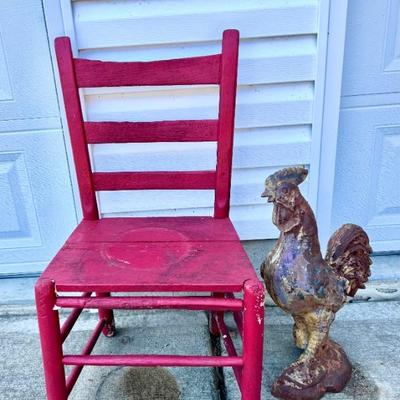 Red Vintage Chair and Cast Iron Rooster