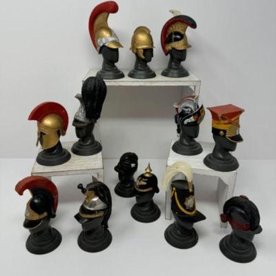 Mini Military Helmets of Worlds Greatest Regiments on Mannequin Heads	