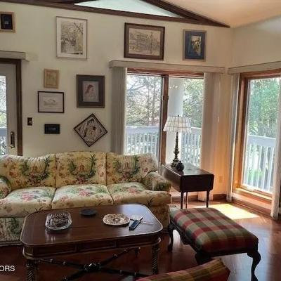 another view of the living room and artwork