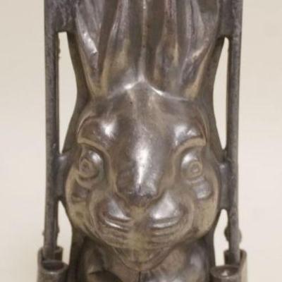 1005	ANTIQUE CHOCOLATE RABBIT MOLD, APPROXIMATELY 3 IN X 7 IN
