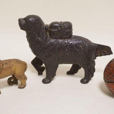1010	3 CAST IRON BANKS LION, DOG & GLOBE, DOG HAS BROKEN TAIL
