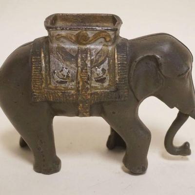 1009	ANTIQUE MECHANICAL ELEPHANT BANK, APPROXIMATELY 5 IN X 2 IN X 3 1/2 IN HIGH
