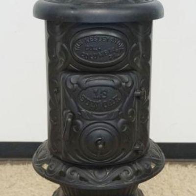 1167	CAST IRON STOVE, THE KEELEY STOVE CO., APPROXIMATELY 47 IN H
