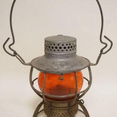 1079	ANTIQUE RAILROAD LANTERN, NEW JERSEY CENTRAL RAILROAD, AMBER GLASS SHADE, APPROXIMATELY 9 1/2 IN
