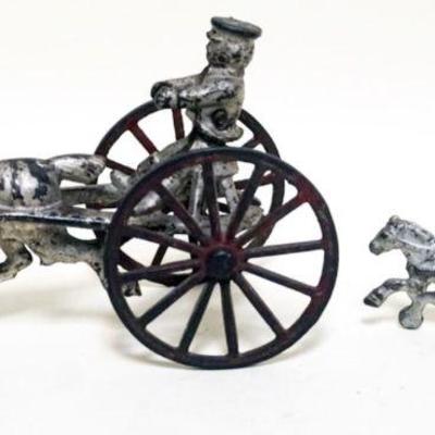1013	2 VINTAGE CAST IRON HORSE DRAWN TOYS, LARGEST APPROXIMATELY 8 IN X 3 IN X 5 IN HIGH
