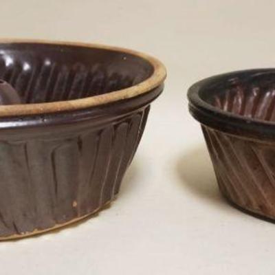 1099	2 EARTHENWARE TURKS HEAD MOLDS, LARGEST APPROXIMATELY 12 IN X 5 IN HIGH
