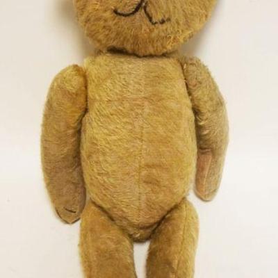 1071	ANTIQUE TEDDY BEAR W/JOINTED ARMS, LEGS & HEAD, APPROXIMATELY 23 IN HGIH

