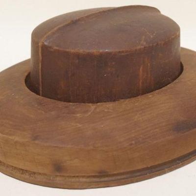 1028	ANTIQUE WOOD HAT MOLD, APPROXIMATELY 12 1/2 IN X 10 1/2 IN C 4 1/2 IN HIGH
