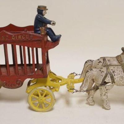 1011	VINTAGE CAST IRON HORSE DRAWN *OVERLAND CIRUS* WAGON, APPROXIMATELY 15 IN X 4 IN X 8 IN HIGH
