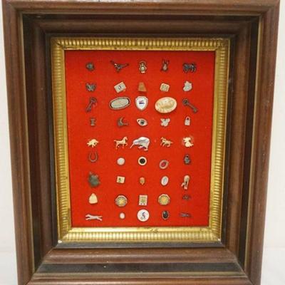 1250	GROUP OF ASSORTED PINS MOUNTED IN WALNUT SHADOW BOX FRAME, APPROXIMATELY 12 IN X 14 IN X 2 1/2 IN
