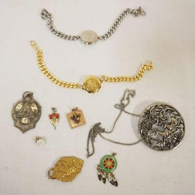 1278	JEWELRY GROUP INCLUDING 2 MEDICAL ALERT BRACELETS, AMERIQUE PENDANT AND FRATERNAL PENDANTS
