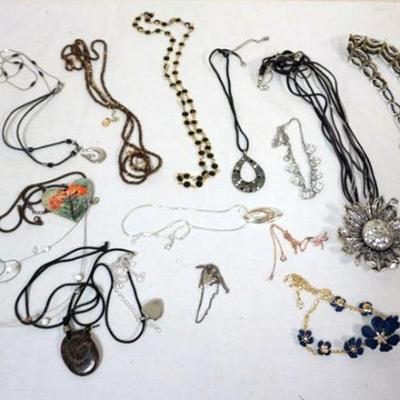 1254	VINTAGE COSTUME JEWELRY APPROXIMATELY 20 + NECKLACES SOME MARKED BY MAKER
