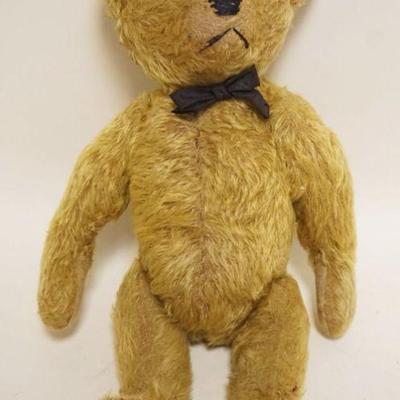 1069	ANTIQUE TEDDY BEAR W/JOINTED ARMS, LEGS & HEAD, APPROXIMATELY 17 IN HIGH
