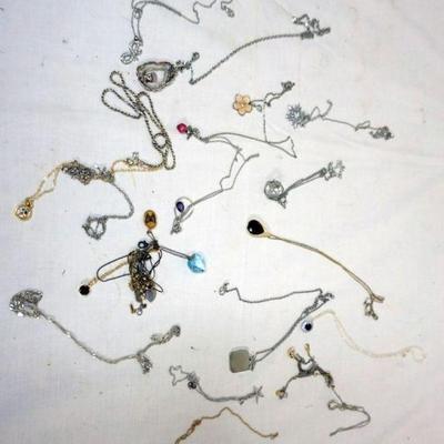 1252	VINTAGE COSTUME JEWELRY APPROXIMATELY 20 + NECKLACES INCLUDING STERLING
