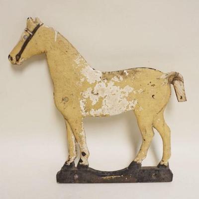 1062	ANTIQUE CAST IRON HORSE, APPROXIMATELY 17 IN X 17 IN, POSSIBLY OFF OF AN OLD STORE SIGN
