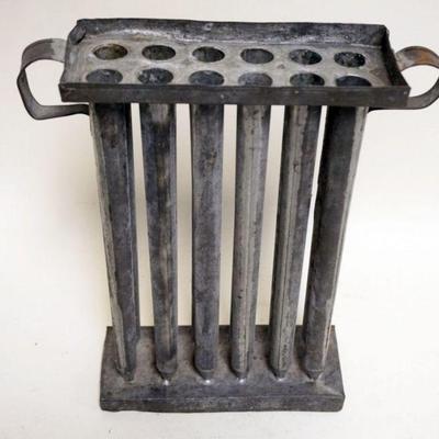1033	ANTIQUE TINE 12 PART CANDLE MOLD, APPROXIMATELY 8 IN X 3 IN X 11 IN H
