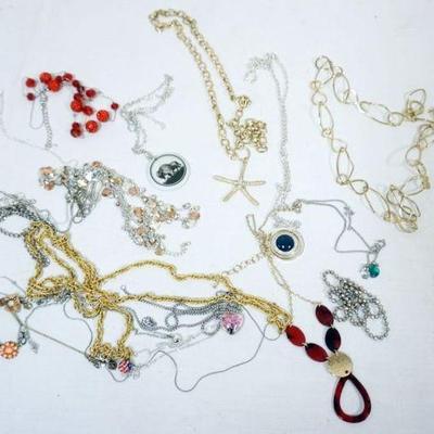 1255	VINTAGE COSTUME JEWELRY APPROXIMATELY 20 + NECKLACES SOME MARKED BY MAKER
