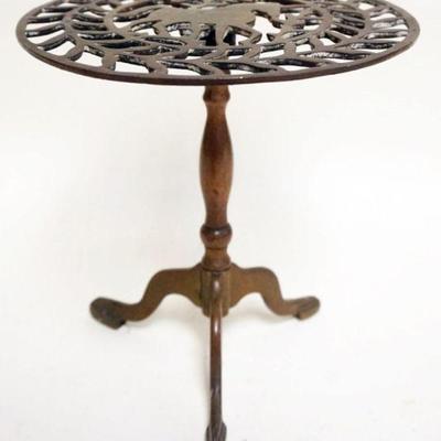 1023	 ANTIQUE BRASS TRIVIT W/IMAGE OF FRETWOK HORSE, APPROXIMATELY 8 1/2 IN X 9 IN HIGH
