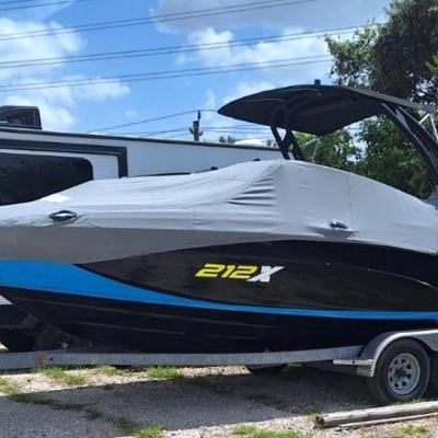 YAMAHA WAKEBOARD BOAT, One owner.  Used 5 times.  ONLY 21 hours on twin engines.  2022 model