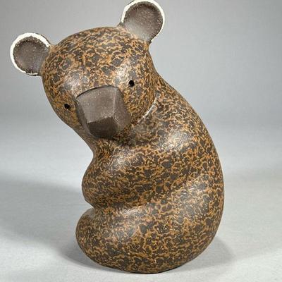 CERAMIC KOALA BEAR FIGURINE | Seated koala bear turning its head. - l. 6.5 x w. 5.5 x h. 9 in

