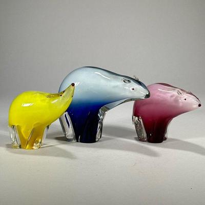 (3pc) Art Glass Bears | A set of three colorful art glass bears in blue, yellow, and pink, no apparent signatures or labels. - l. 9 x h....